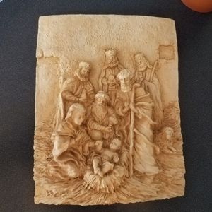 Nativity scene hanging plaque.